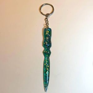 A beautiful green resin self-defense tool
